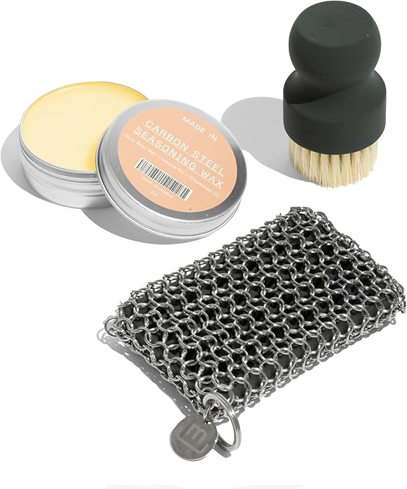 Made In Cookware - 3-Piece Carbon Steel Cleaning Set - Includes Chain Mail Scrubber, Cleaning Brush and Carbon Steel Seasoning Wax