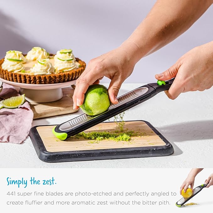 Dreamfarm Ozest Self-Cleaning POP-Button Zester for Fine, Fluffy Citrus Zest, Cheese, Nut, & Spices with Non-Slip Silicone Foot - 1mm Zester, Black/Green