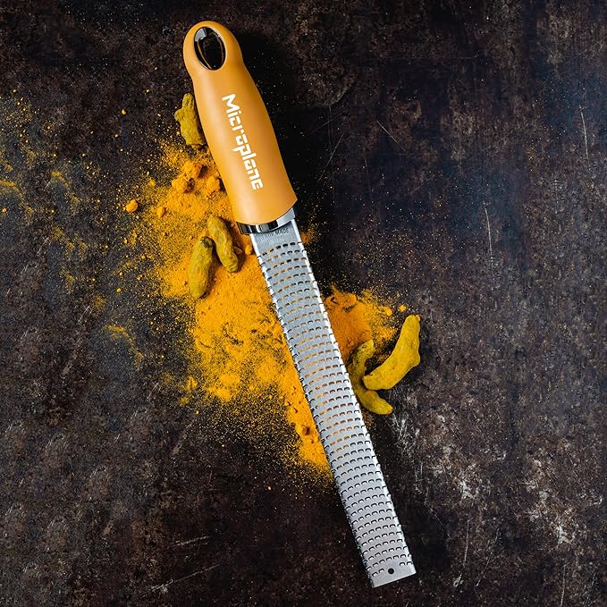 Microplane Premium Zester Grater in Mustard | Lemon Zester tool, Hard Cheese & Vegetable Grater | For Citrus, Parmesan Cheese, Garlic, Ginger, Nutmeg | Fine Stainless Steel Blade, Made in USA