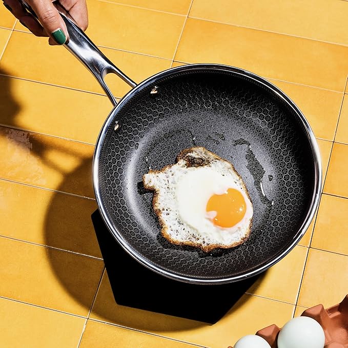 HexClad Hybrid Nonstick 7-Inch Frying Pan with Tempered Glass Lid, Stay-Cool Handle, Dishwasher-Friendly, Oven-Safe Up to 900°F, Induction Ready, Compatible with All Cooktops